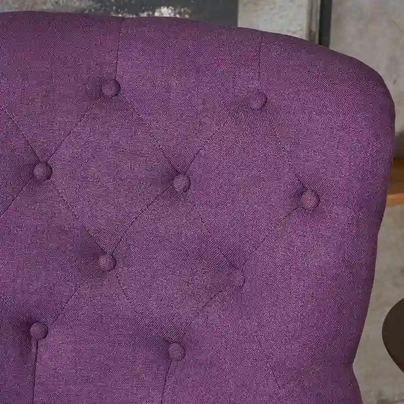 Fauteuil club en tissu capitonné avec dossier incurvé et pieds en bouleau