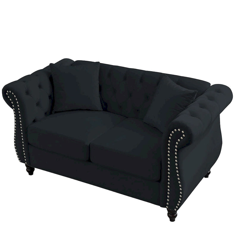 Canapé 2 places Chesterfiled en velours noir avec dossier touffeté, accoudoirs roulés et garniture cloutée
