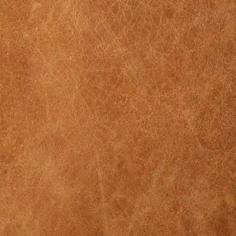 Fauteuil de salon capitonné en cuir italien avec pieds en bois massif et coussin en plumes