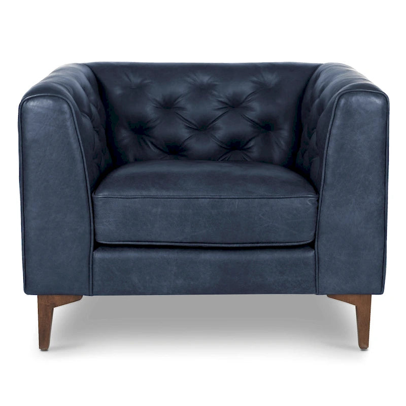 Fauteuil de salon capitonné en cuir italien avec pieds en bois massif et coussin en plumes